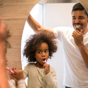 Should you floss before or after brushing? Portrait